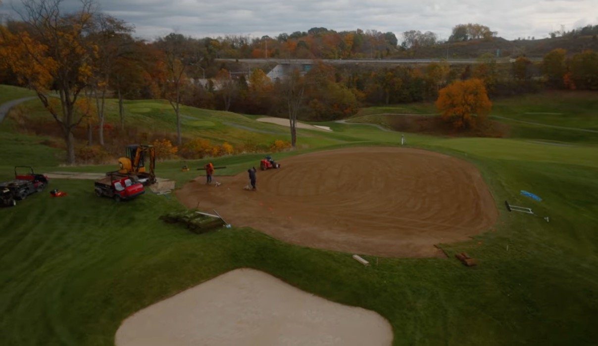 Golf course construction underway on a reshaped fairway