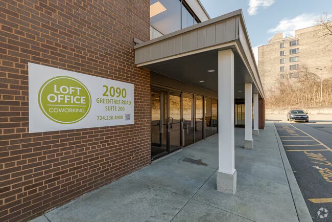Entrance to 2090 Greentree Road with LOFT Office coworking signage
