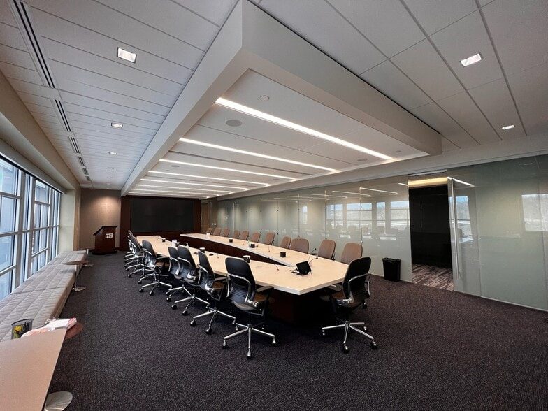Boardroom at 1001 Horizon Vue Drive with a long conference table, lectern and window wall