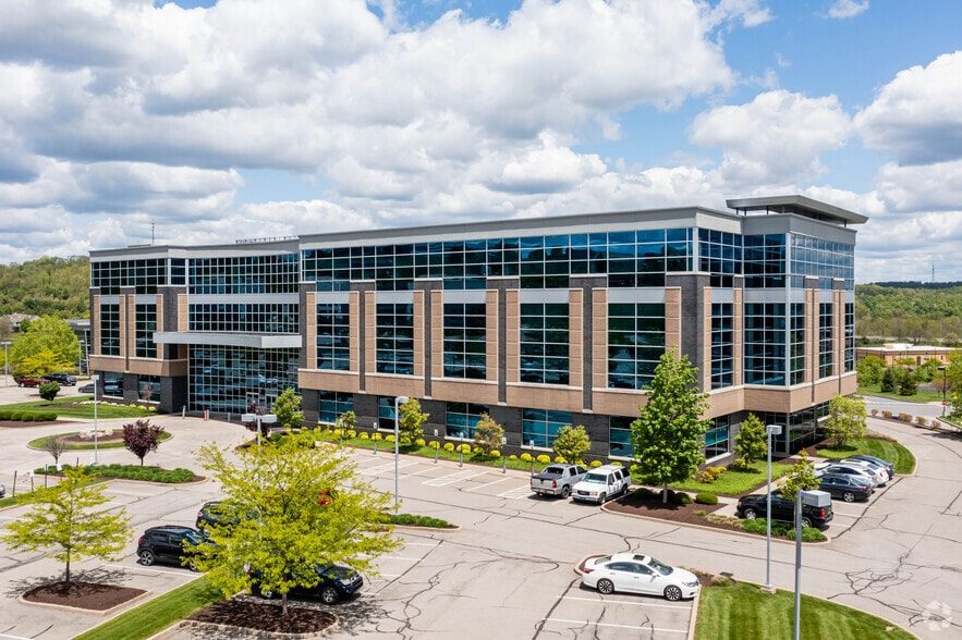4000 Town Center Blvd seen from the northeast, showing its full glass and brick elevation