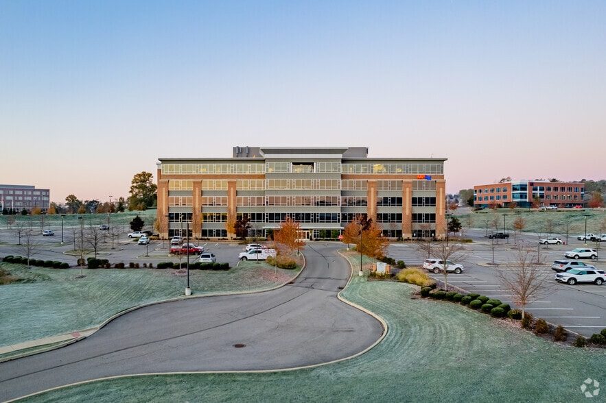 4600 J. Barry Court at dawn, with frost across the surrounding lawns and parking